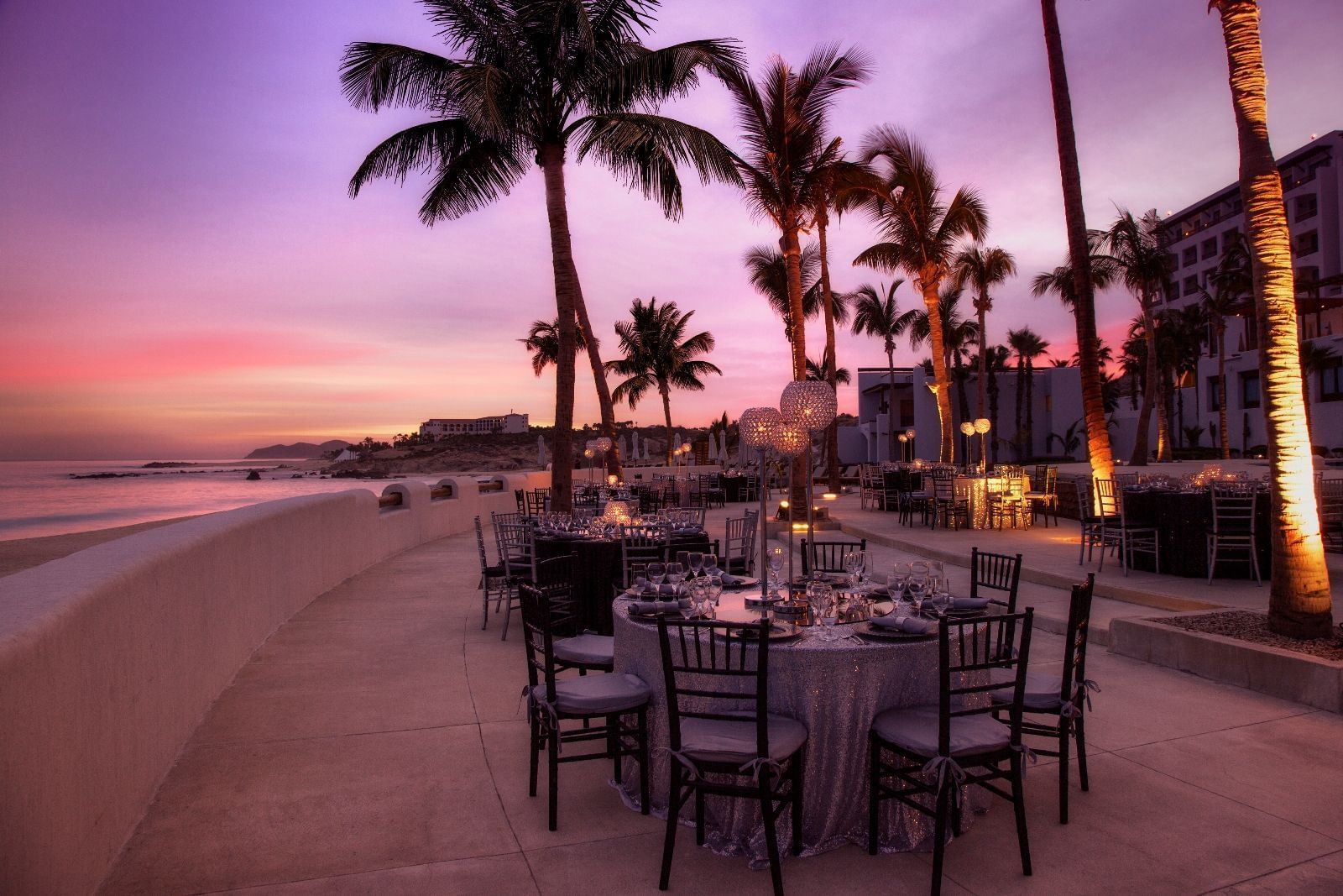 Outdoor dining area during the beautiful sunset at Los Cabos
