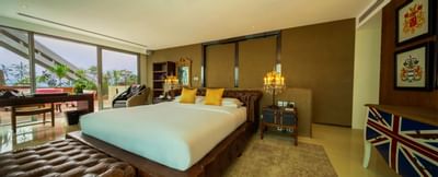 Interior of a room with a king bed at Hotel Eclat Beijing