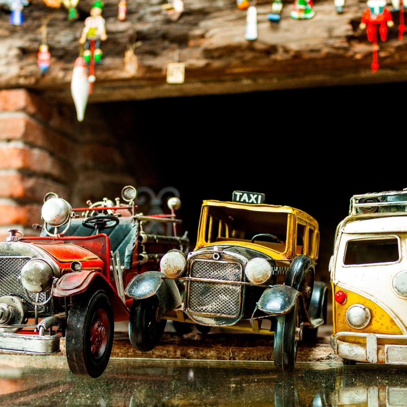 Closeup on some toy vehicles at Las Cumber Boutique Hotel