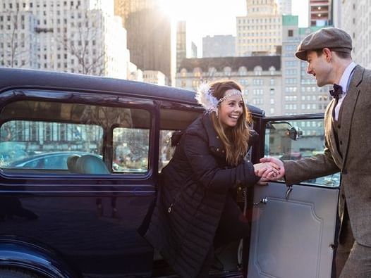 Man and lady hand shaking near the ArtHouse Hotel New York City