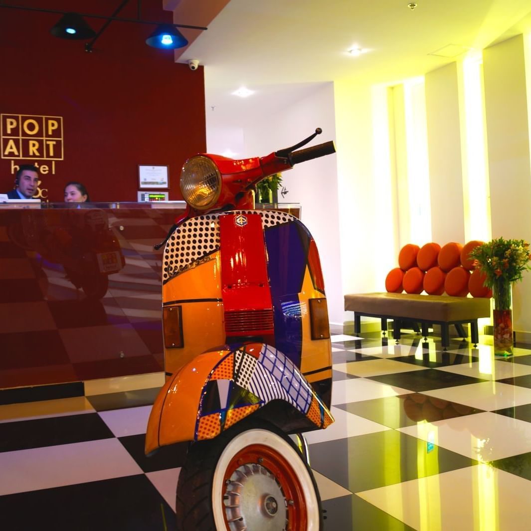 A bike parked in the hotel lobby for décor at Pop Art Tocancipa