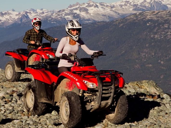 People riding ATVs in ATV Tours near Aava Whistler Hotel