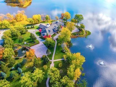 Aerial view of hotel and lake at Chateau Vaudreuil