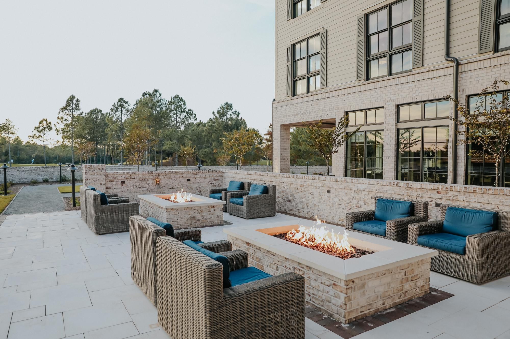 Camp Creek Inn's cozy outdoor seating area with fire pits