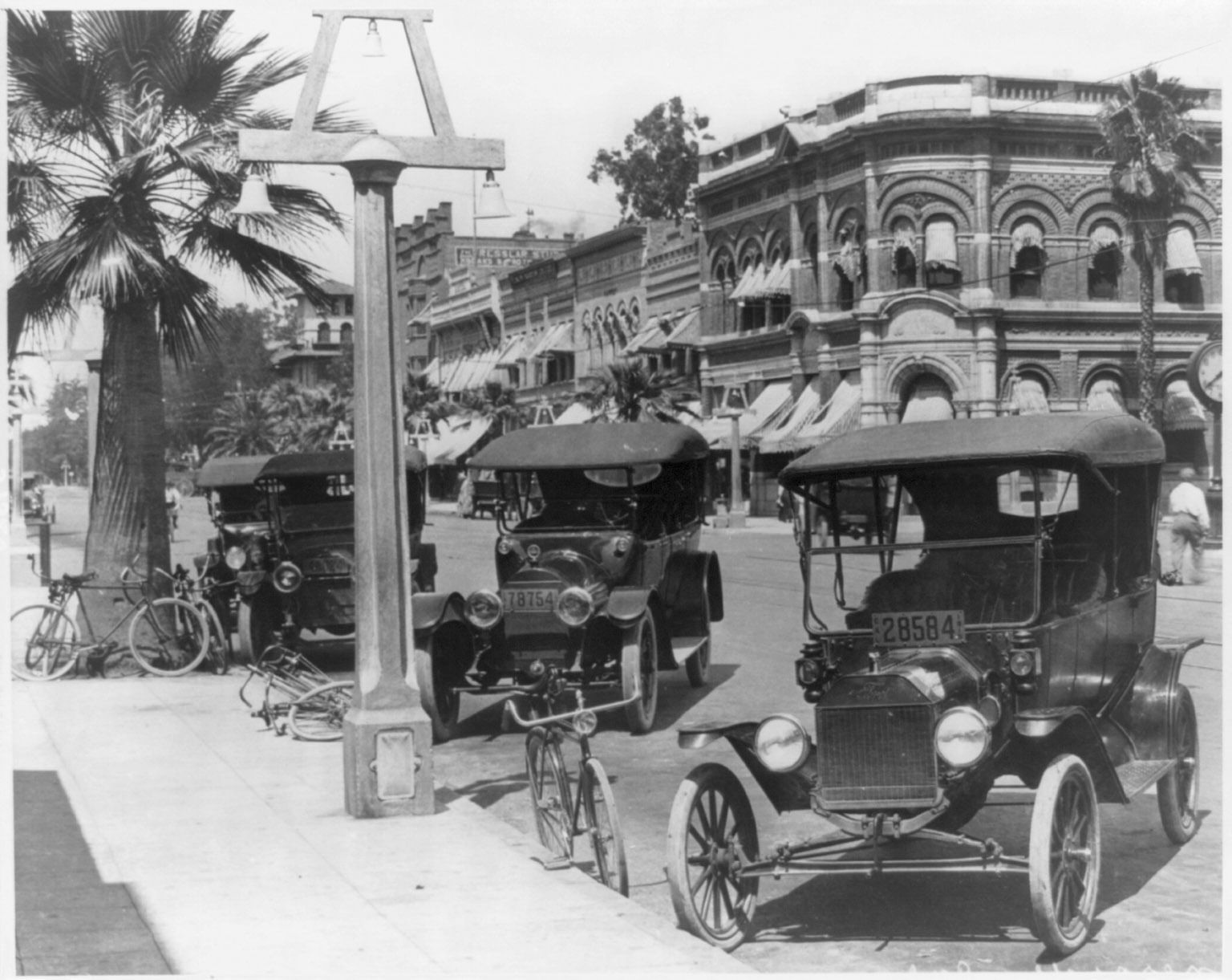 Vintage cars parked on street near Mission Inn Riverside