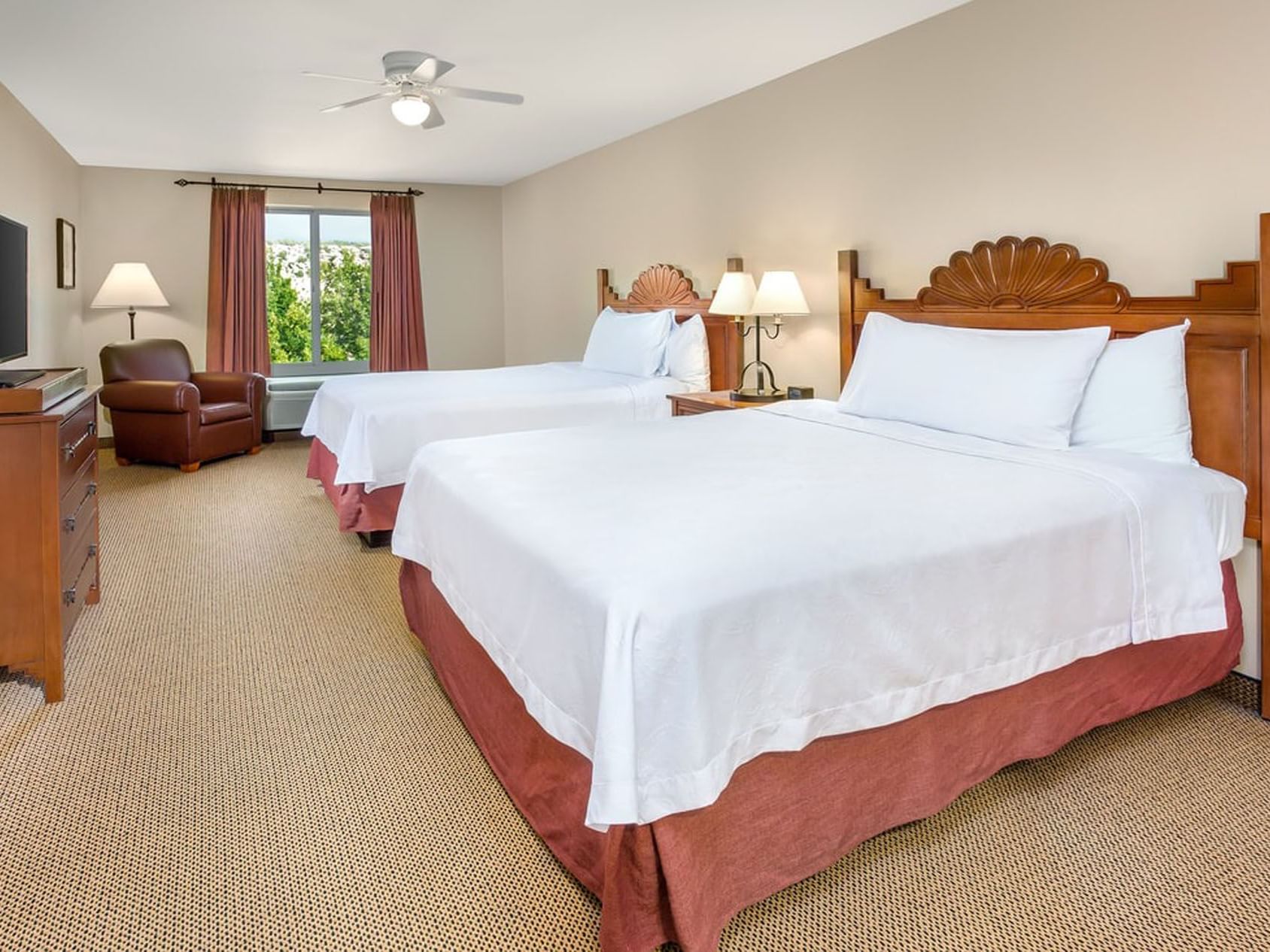 Two Queen Beds One Bedroom Suite at the Hilton Santa Fe Buffalo Thunder hotel.s and carpet.