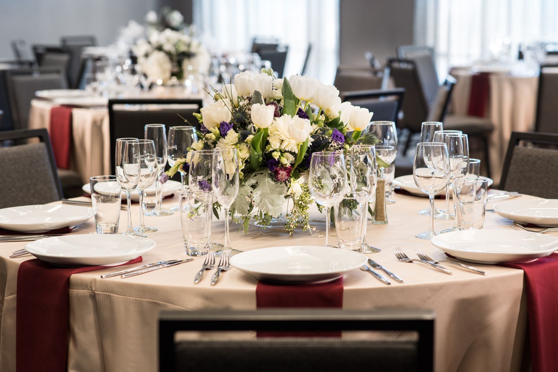 Banquet rounds set with floral center pieces