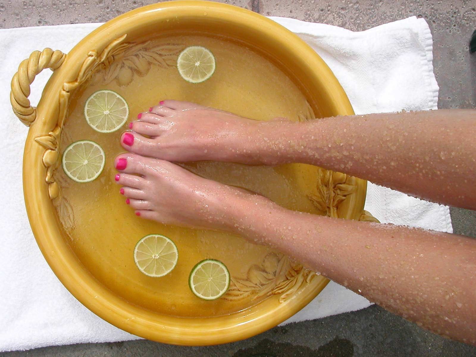 A woman getting a foot treatment at Kelly's Spa & Boutique
