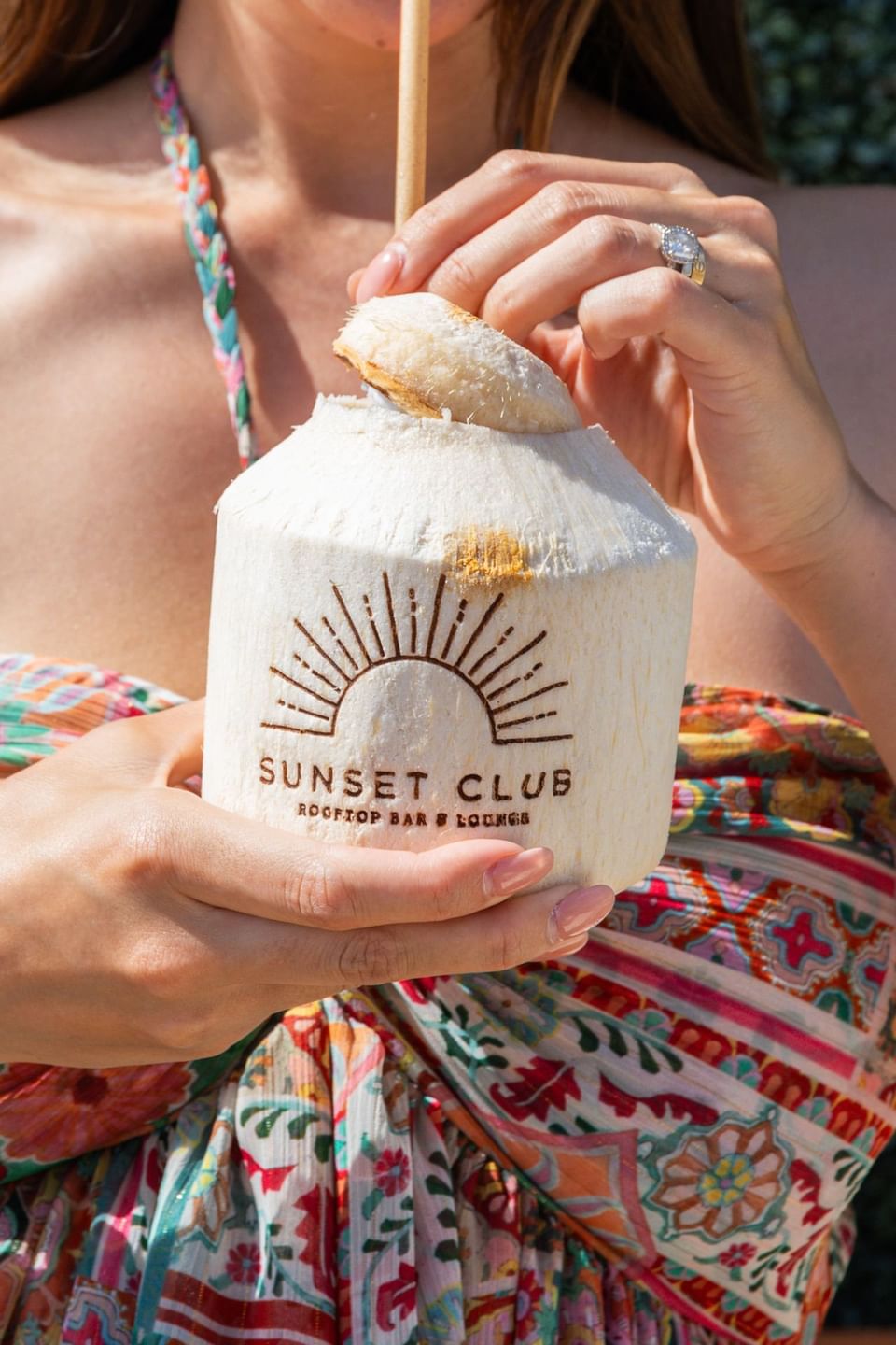 Hotel-branded trimmed coconut at Costa Beach Resort