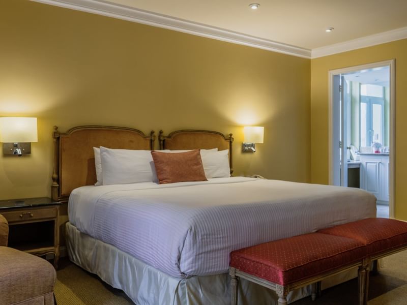 Large bed in the Presidential Suite at Gamma Hotels