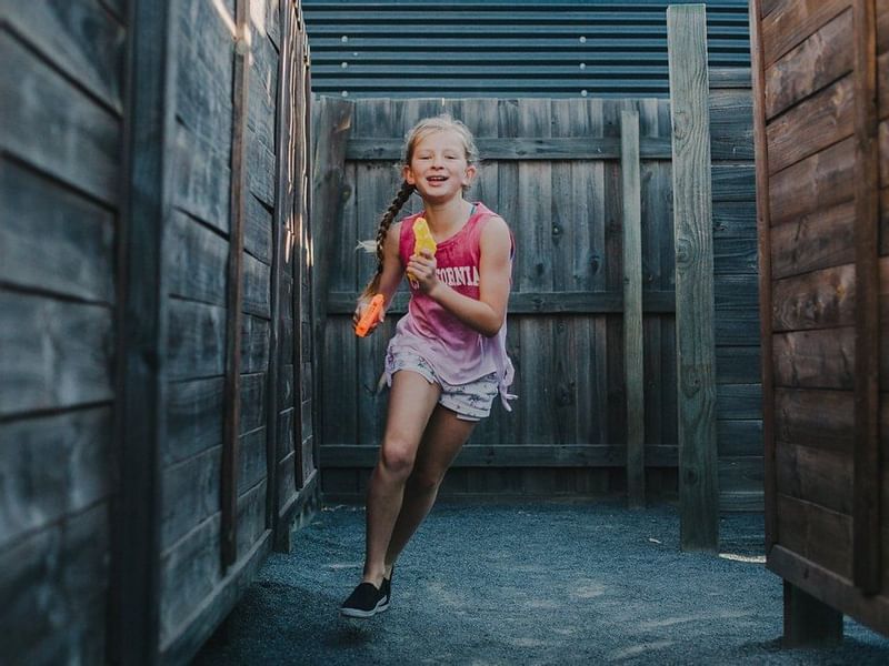 Girl running in a Yallingup Maze near Pullman Bunker Bay Resort