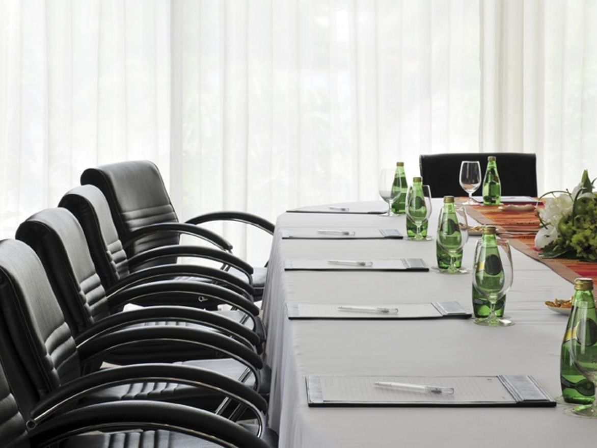 Closeup of a boardroom table arrangement at Paradox Resort