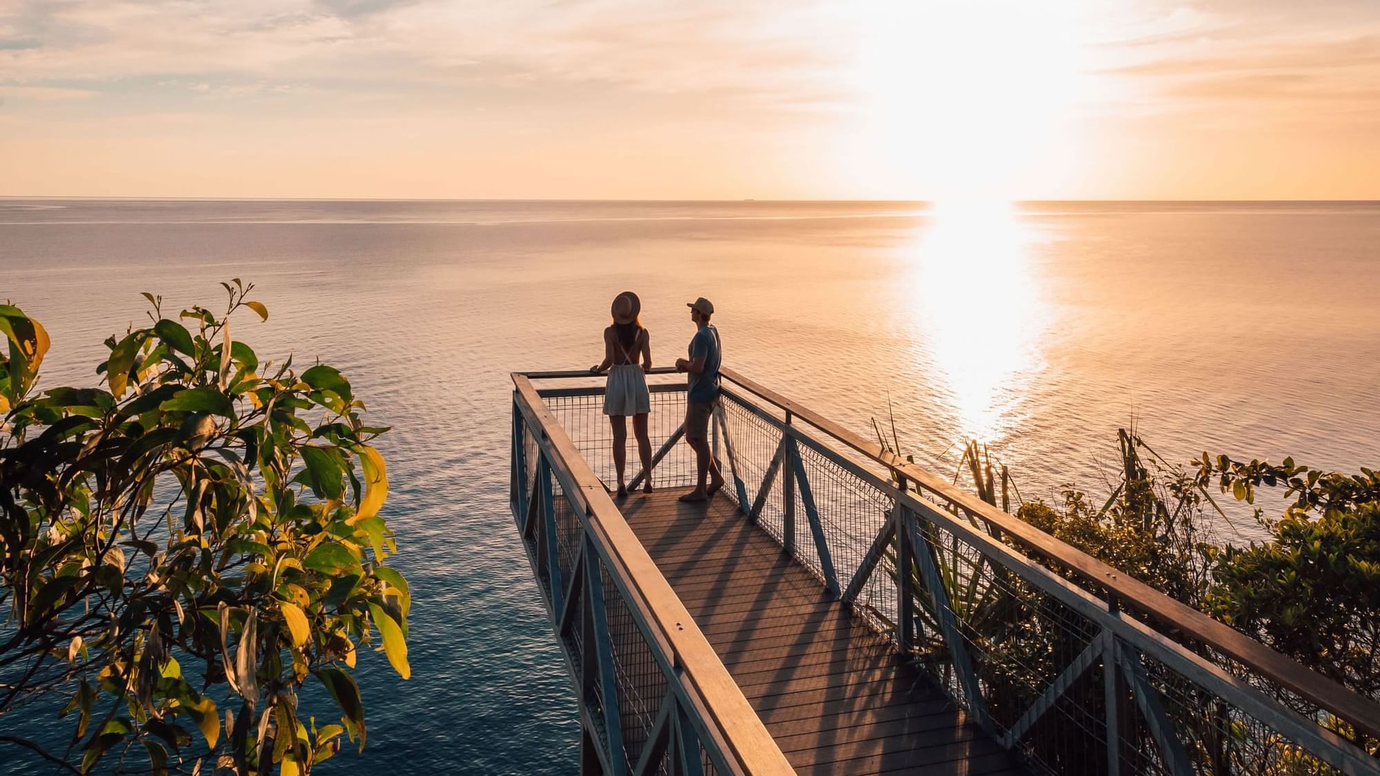 Couple overlooking sea in Flagstaff Hill Lookout at 	
Pullman Port Douglas