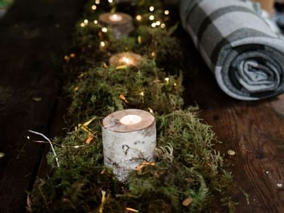 Table decoration with candles & leaves at Alderbrook Resort