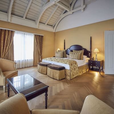 Wooden floor, bed & lounge Romantik Suite, Falkensteiner Hotels