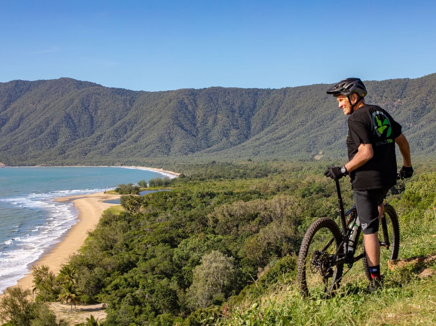 Man on a mountain biking tour near Pullman Cairns International