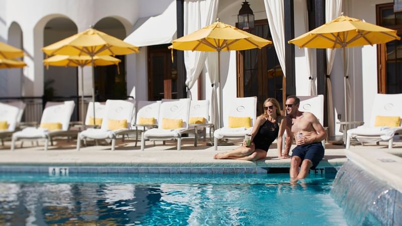 Couple at adults only pool at The Pearl Hotel