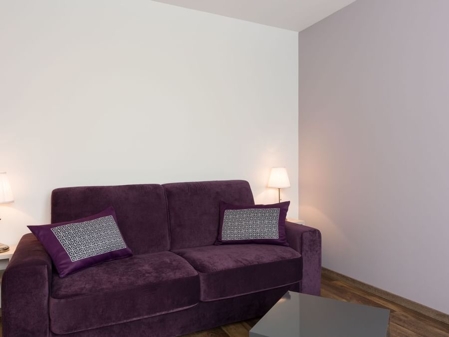 Closeup of a sofa in a lounge area at Le Relais des Carnutes