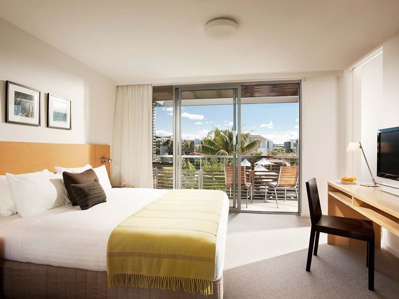 TV facing the king bed in Two Bedroom Villa at Pullman Magenta Shores