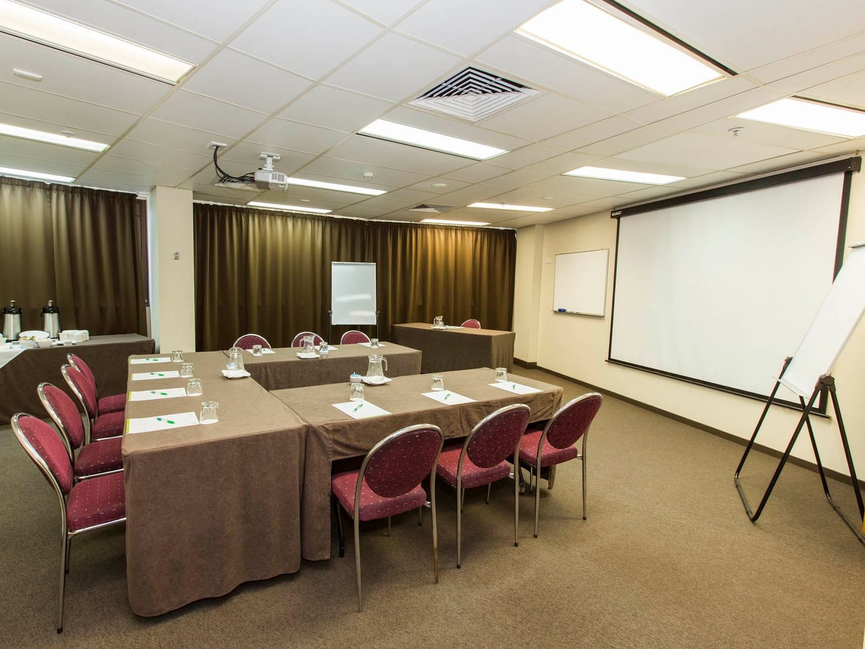 U-shaped meeting room set up in Melton Hill Room at Hotel Grand Chancellor Townsville