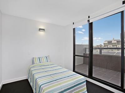 Self-contained one bedroom balcony apartment - bedroom view