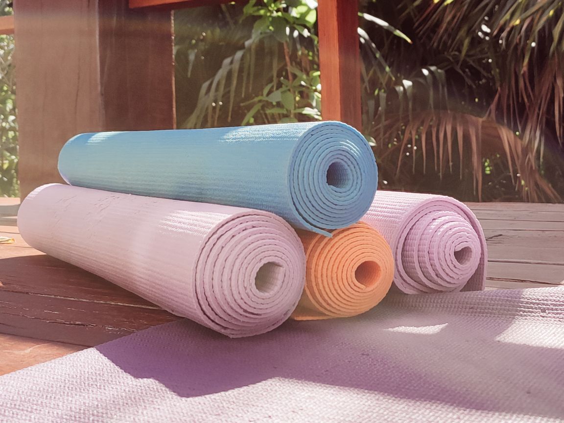 Close up on rolled yoga mats at Haven Riviera Cancun