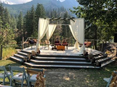 Outdoor wedding ceremony arranged at Sleeping Lady at sunset