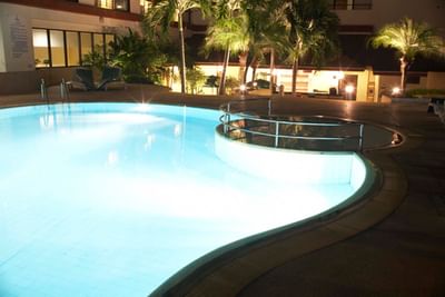 Outdoor Pool at night in Amora Hotel Chiang Mai