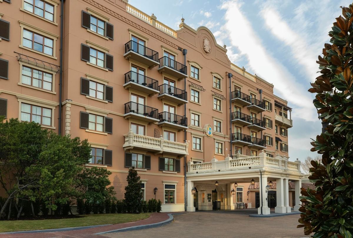 Elegant exterior of Granduca Houston, one of the top Houston luxury hotels, with cavalryman statue at entry