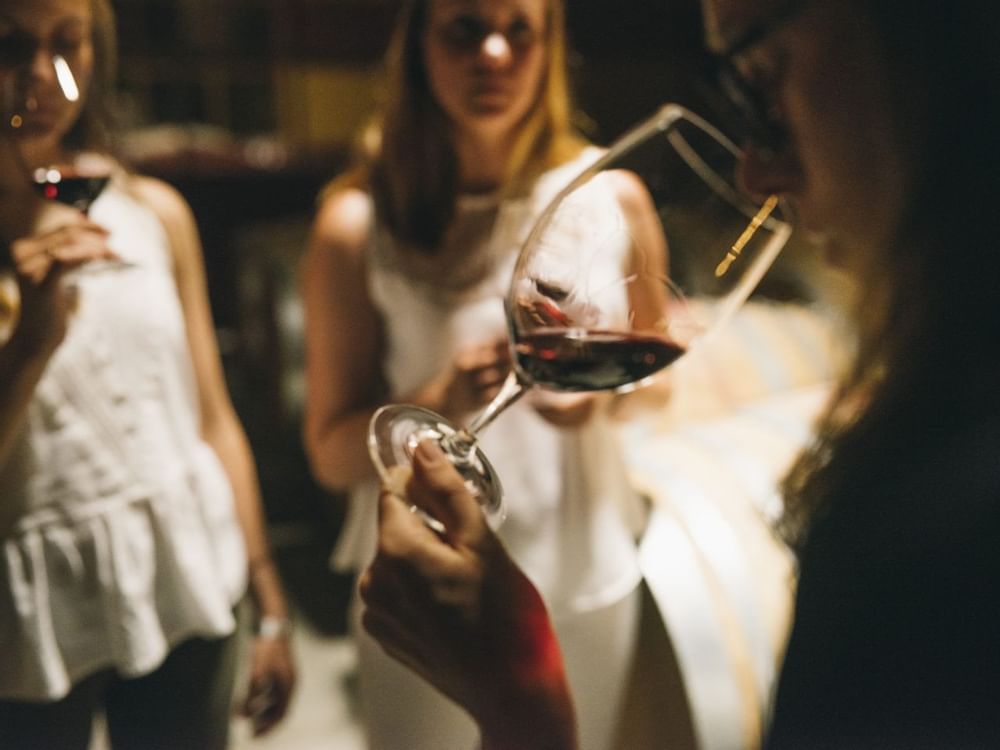 Closeup of a group of ladies having wine at Marbella Club Hotel