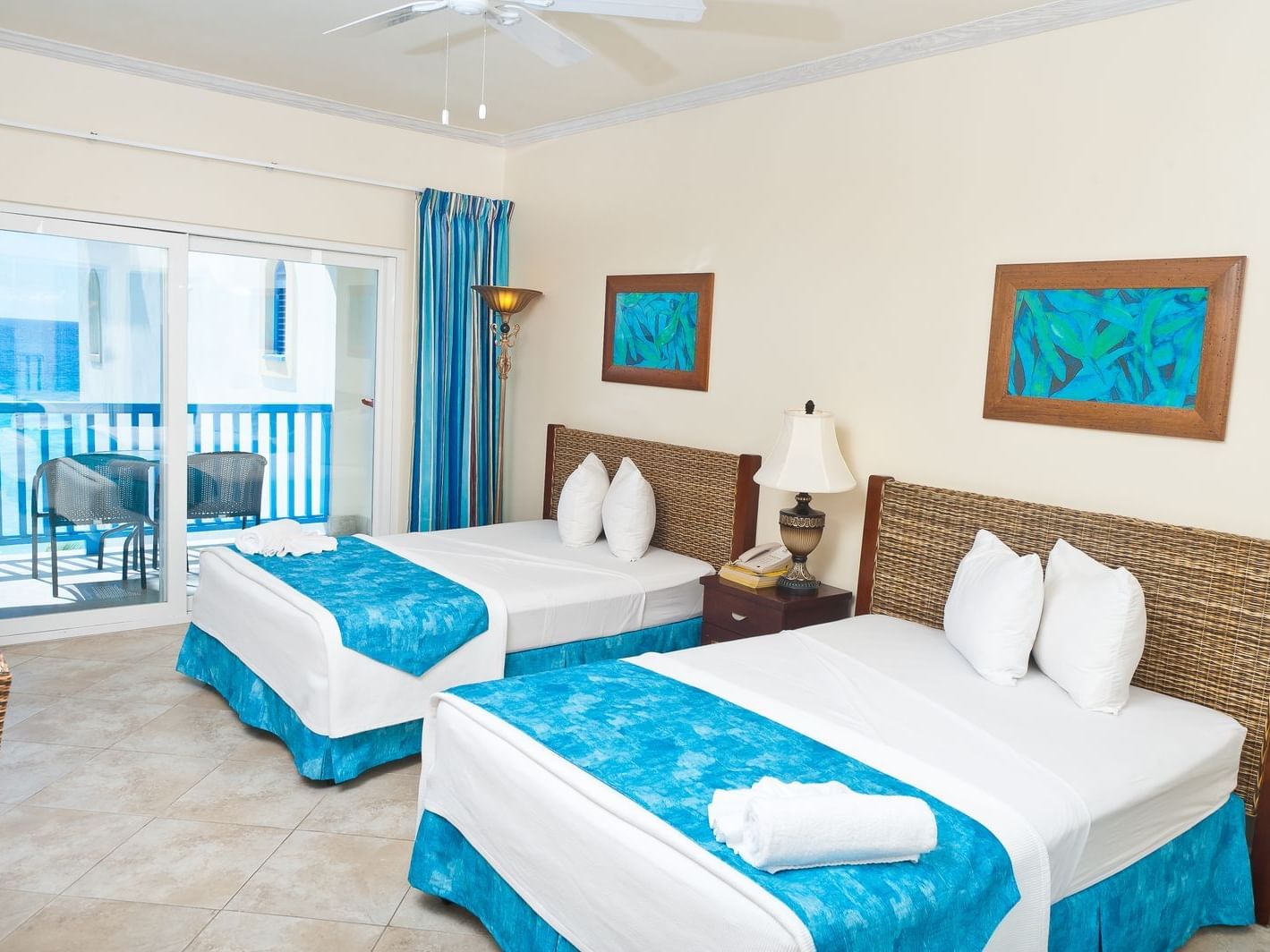 Deluxe Island View Studio with two double beds, balcony and ocean view at Rostrevor Hotel