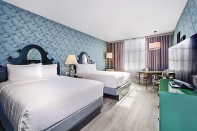 Beds in Executive Double Double Courtyard View at Hotel Fiona