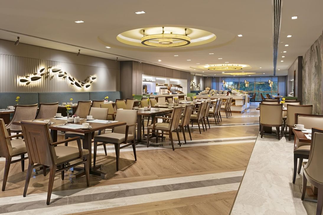 Alesta Restaurant dining area with ambient lighting and modern decor at Titanic Port Bakirkoy