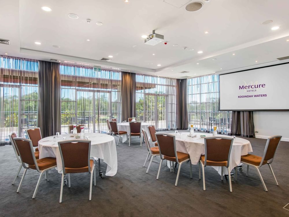 Conference room with large windows and sheer curtains with lots of space at Mercure Kooindah Waters