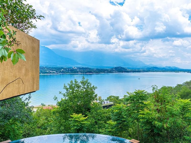 Aerial view of lake and mountains at Gamma Monterrey Rincón de Santiago