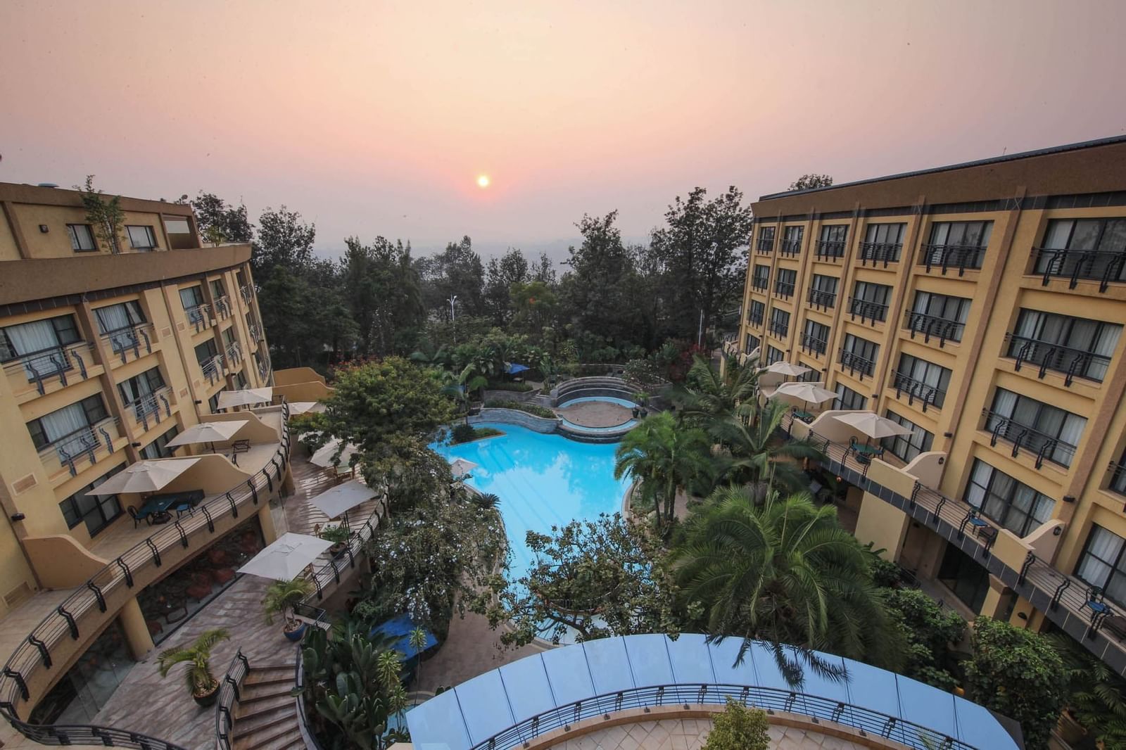 An Aerial view of Kigali Serena Hotel with pool