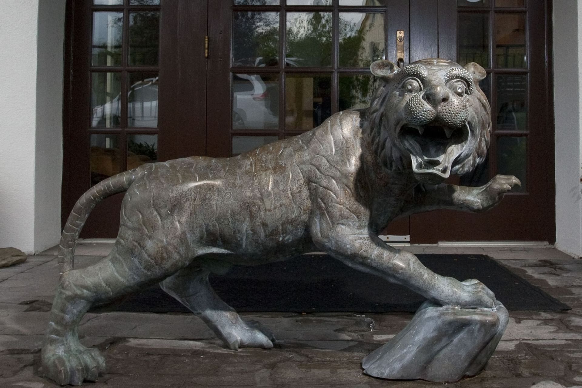 Closeup of a tiger statue at August Moon Spa