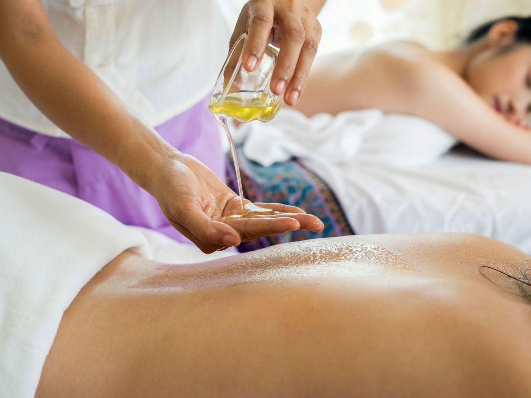 Women getting a massage in a spa at Mont Gabriel Resort & Spa