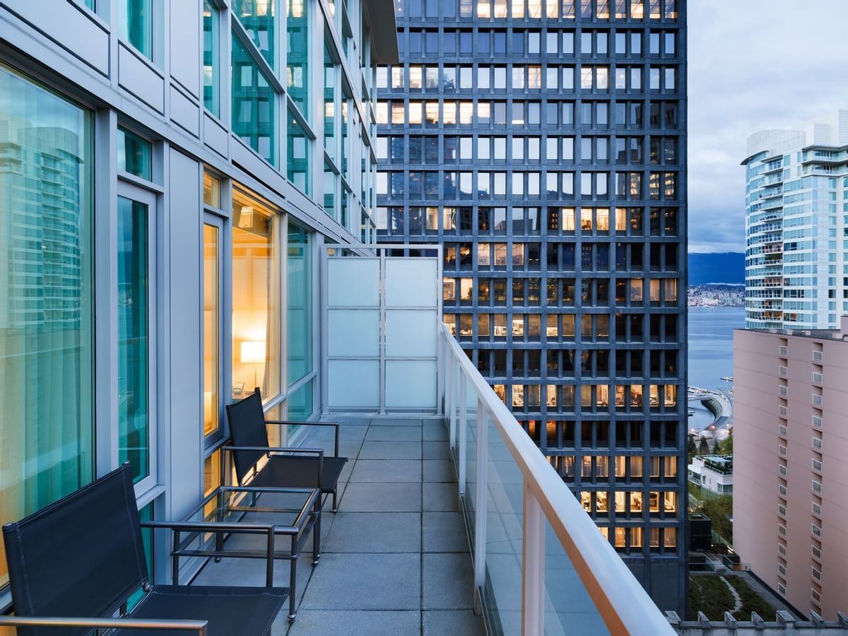 Hotel suite balcony with view of city and harbour