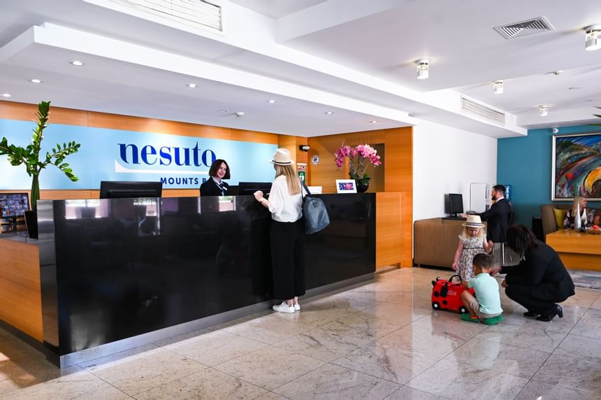 Guests checking in by the reception at Nesuto Mounts Bay