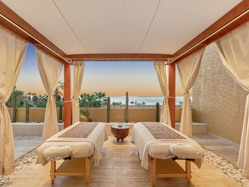 Outdoor massage cabin with spa beds & ocean view at Grand Fiesta Americana