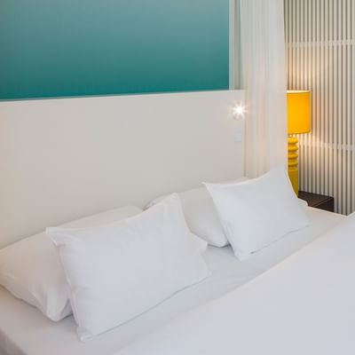 Double bed in Superior Room at Falkensteiner Hotel Jesolo