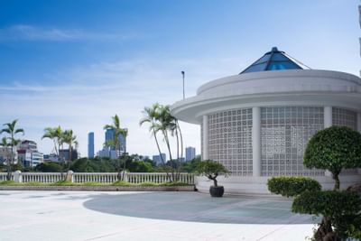 A white building with a circular roof at Hanoi Daewoo Hotel