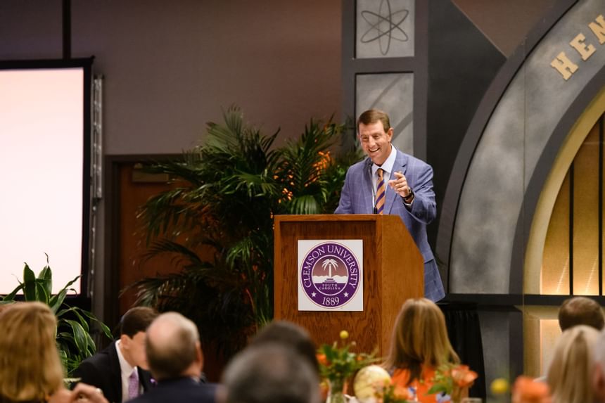 clemson football coach dabo swinney speaking at a conference
