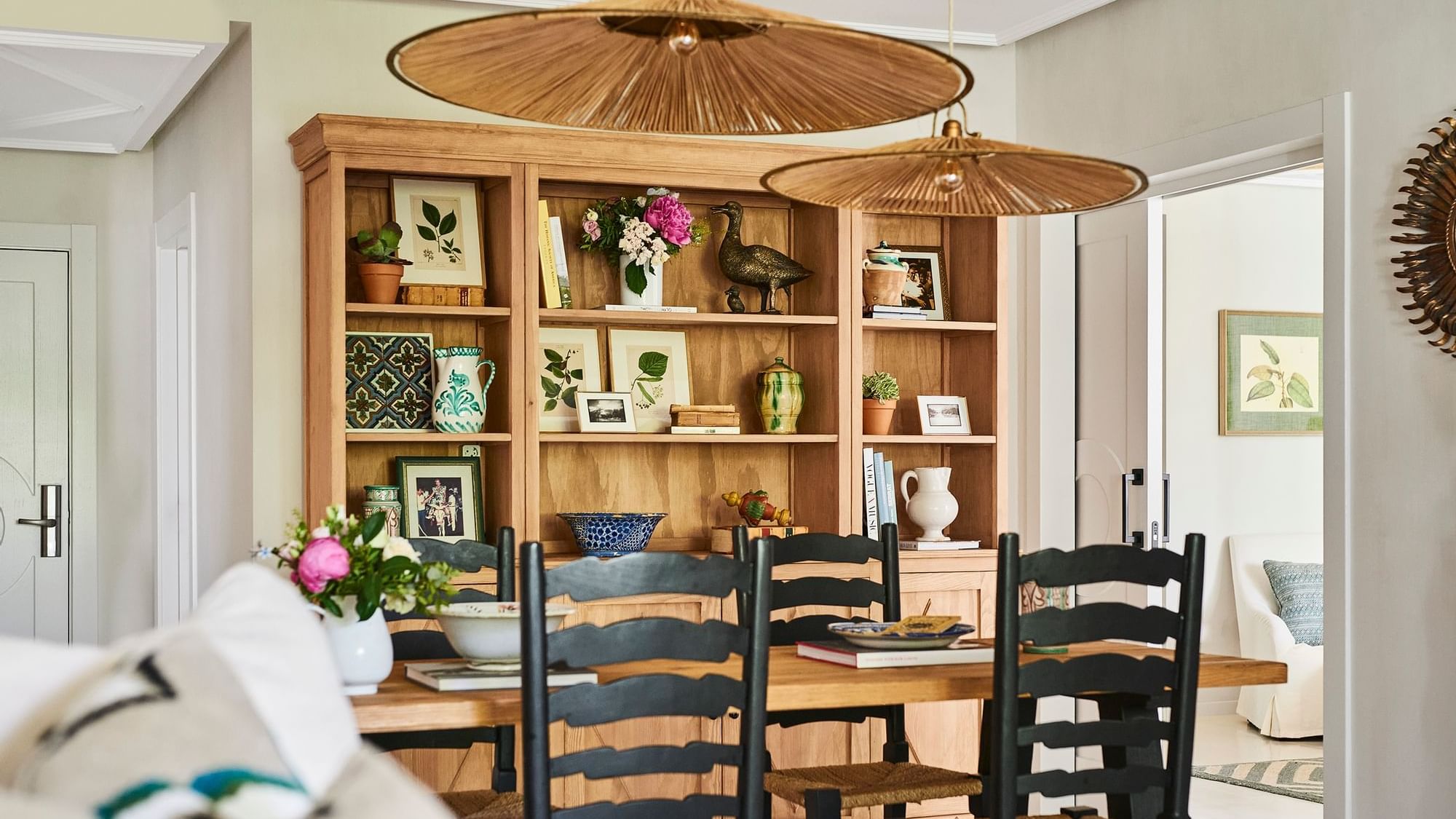 Santa Margarita 2-Bedroom Suite featuring black spindle-back chairs and a tall wooden bookcase at Marbella Club