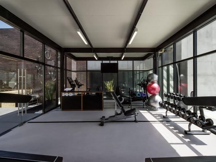 Interior of the fitness center at FA Hotels & Resorts