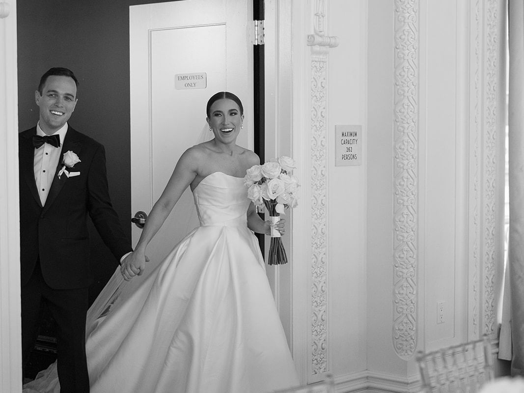 Bride & groom at wedding reception at The Mayo Hotel