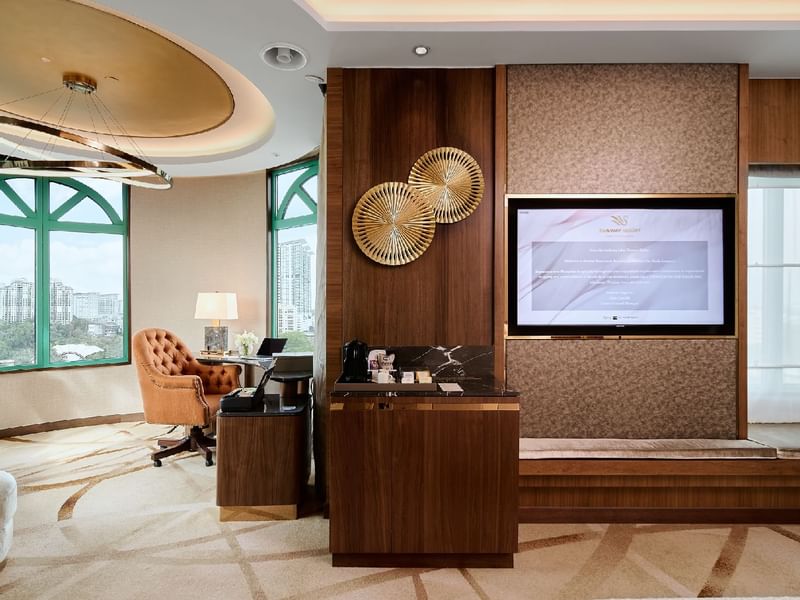 Living area with mirror and dining table in Executive Suite at Sunway Hotel Big Box