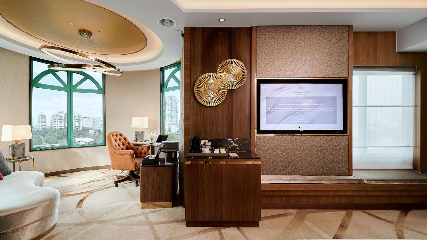 Living area with mirror and dining table in Executive Suite at Sunway Hotel Big Box