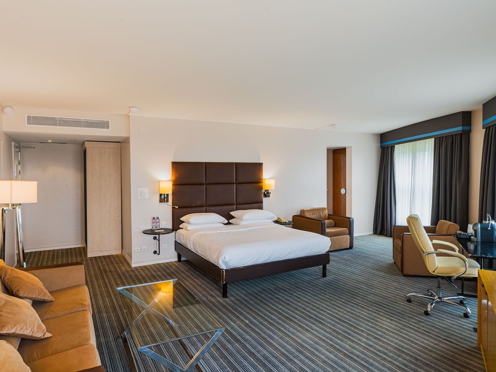 Junior Suite with king bed at The Atrium Hotel by Penta